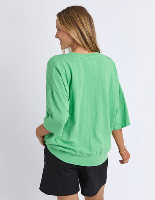 Elm Mazie Vee Neck Meadow Green, Back view showing slouchy fit and hem band | AAAG