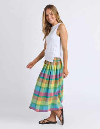 Elm Leyla Tank White, Side walking profile styled with colourful midi skirt | AAAG