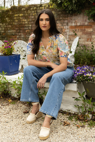 Seeking Lola Gardenia Top Floral Multi, Styled seated outfit | AAAG