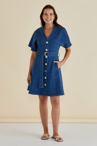 Woman wearing a blue denim button-down dress with a matching belted waist.