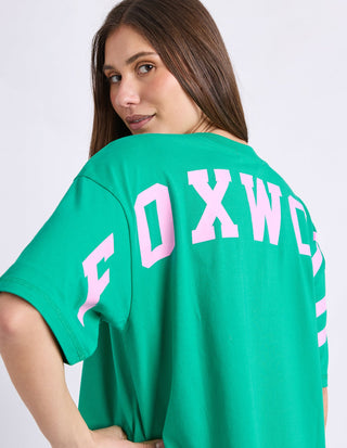 Side hem view of Foxwood Interval Short Sleeve Tee in green