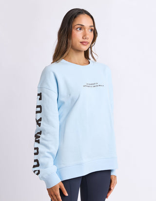 Close-up of Foxwood Origin Crew light blue chest embroidery